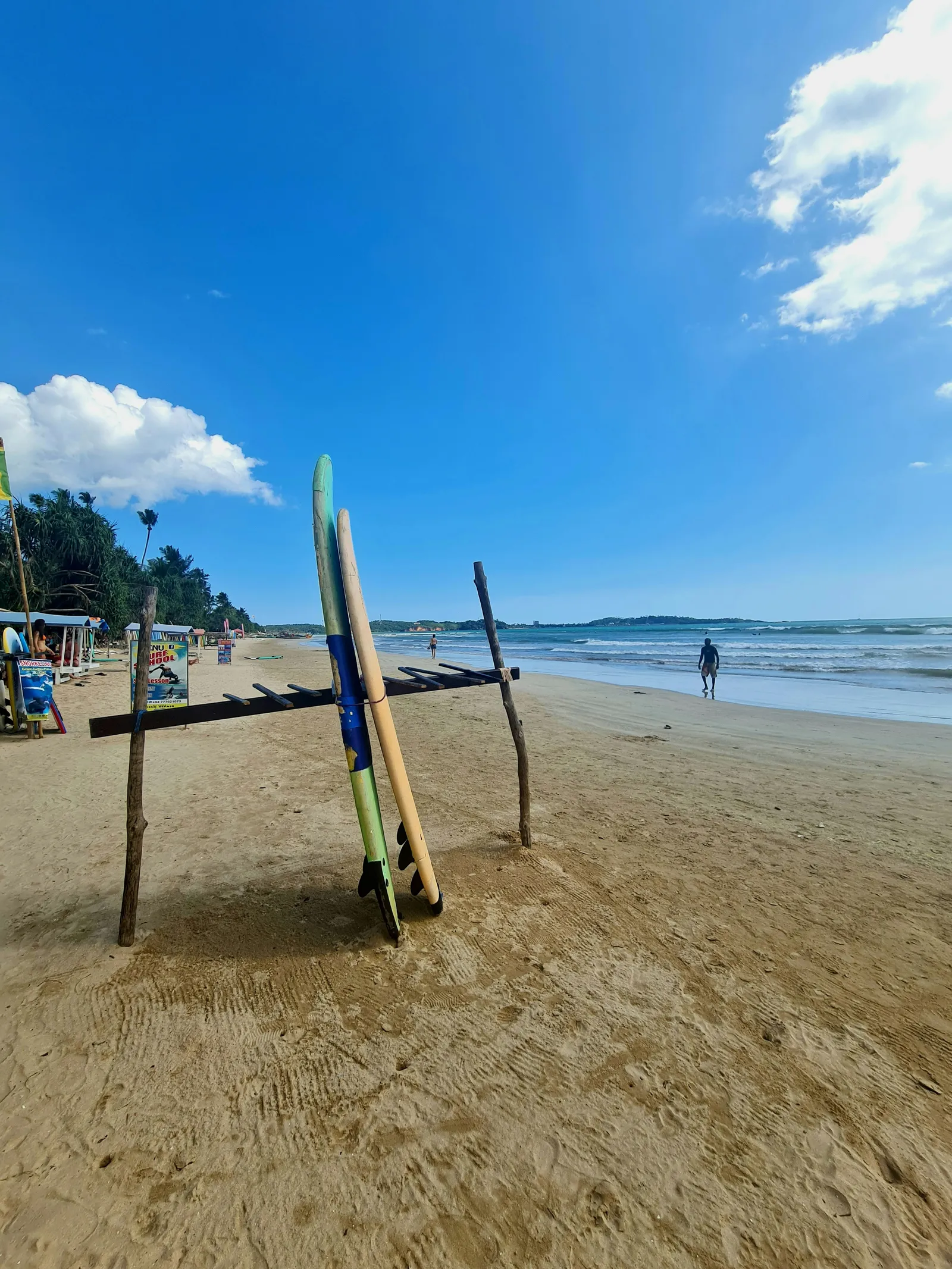 Surfers in Weligama
